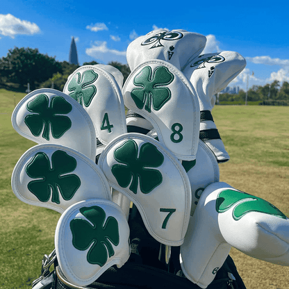 White Luck of the Irish irons head covers in golf bags