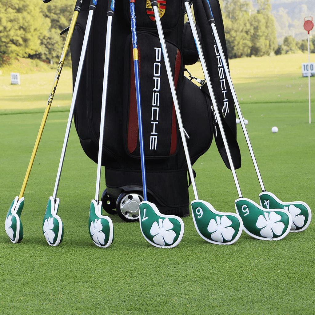 Green Lucky clover iron covers golf in filed